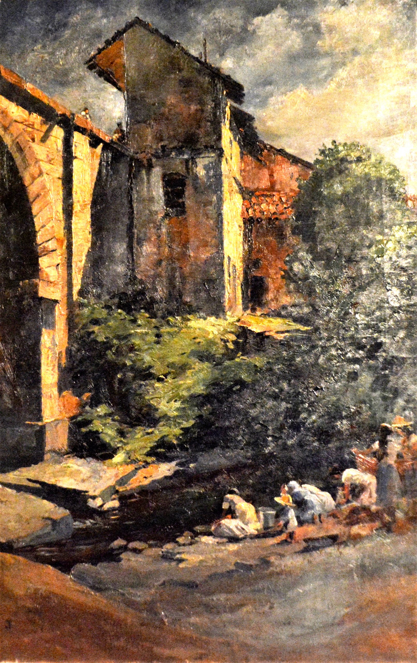 Women on the riverbank in front of the city walls