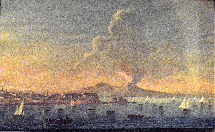 Volcanic eruption behind a seascape
